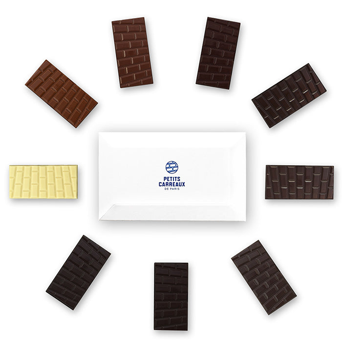 Packshot coffret Petits Carreaux de Paris au centre, entouré de ses 9 mini tablettes de chocolat